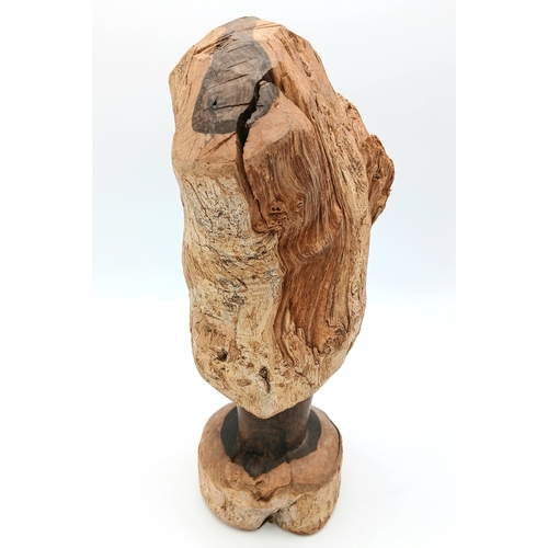1173 - A vintage hand-carved Tribal wooden sculpture from a solid wood trunk. Height 28cm. Please see photo... 