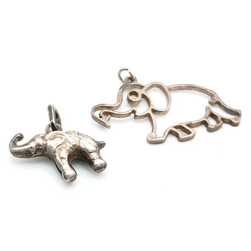 1200 - A Sterling Silver Elephant Outline Pendant along with A Sterling Silver Elephant Charm Pendant. An E... 