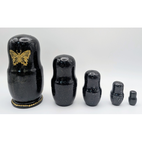 1267 - A Russian Swan Lake Ballet Nesting Doll Set, comprising five wooden dolls. Each piece fits neatly wi... 