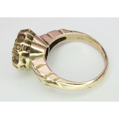 722 - An Antique 9K Gold Gilded Silver Diamond Cluster Ring. Approximately 0.42ctw diamonds. Size H 1/2 - ... 