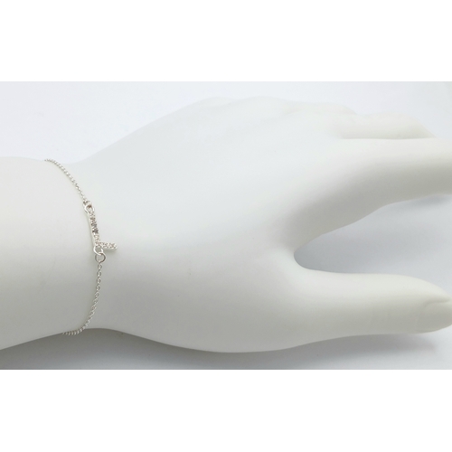 1154 - A STERlING SILVER, INITIAL L, STONE SET, BRACELET. A/S SIL 21