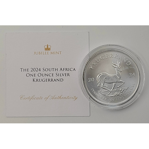 1163 - A Fine Silver (.999) 1oz South African Krugerrand Coin. Brilliant uncirculated. Comes with COA and c... 