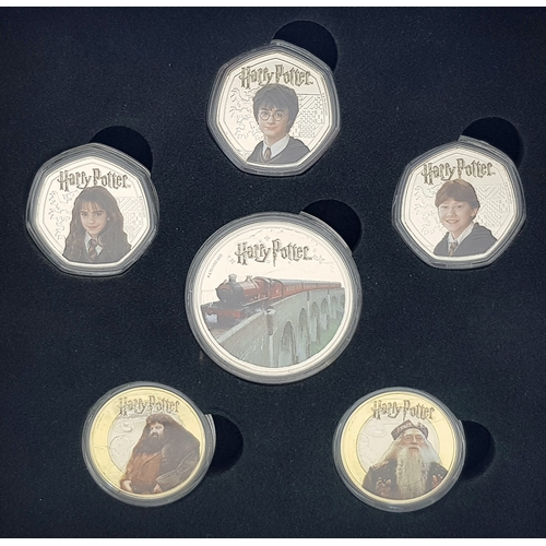 1206 - A Harry Potter 2024 Commemorative Coin Set. Comes with COA and case. Limited edition six coin set.