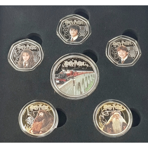 1206 - A Harry Potter 2024 Commemorative Coin Set. Comes with COA and case. Limited edition six coin set.