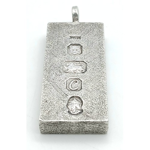 38 - A Sterling Silver Queen Elizabeth II Jubilee Ingot Pendant. 4.5cm. 31.8g