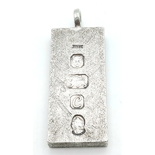 38 - A Sterling Silver Queen Elizabeth II Jubilee Ingot Pendant. 4.5cm. 31.8g