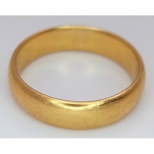 8 - A 22K Yellow Gold Band Ring. 6mm width. Size O. 5.9g.