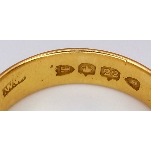 8 - A 22K Yellow Gold Band Ring. 6mm width. Size O. 5.9g.