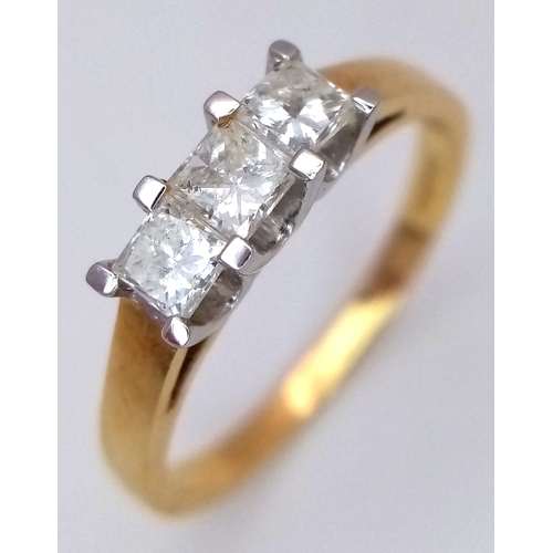 11 - An 18K Yellow Gold Diamond Trilogy Ring. Three Princess cut diamonds - 0.50ctw having F-G colour wit... 