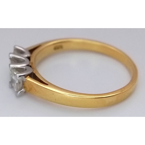 11 - An 18K Yellow Gold Diamond Trilogy Ring. Three Princess cut diamonds - 0.50ctw having F-G colour wit... 