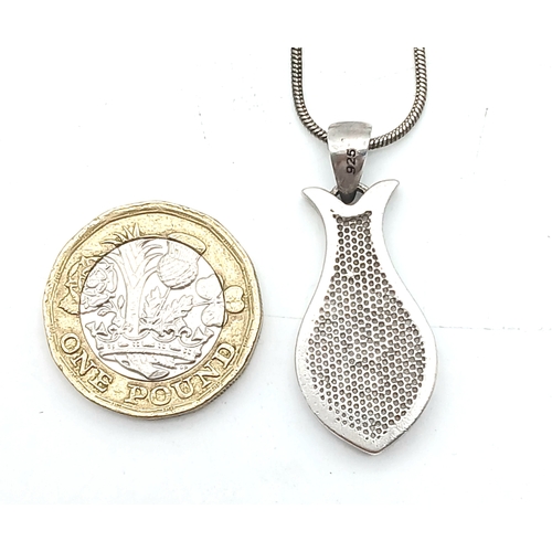 1170 - A Sterling Silver Fish Shaped Pendant with an Enamel Eye Design on an 18K Gold Plated Necklace. Pend... 