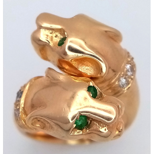 37 - A 14K Yellow Gold, Emerald and Diamond Twin Panther Crossover Ring. Emerald eyes and diamond set nec... 