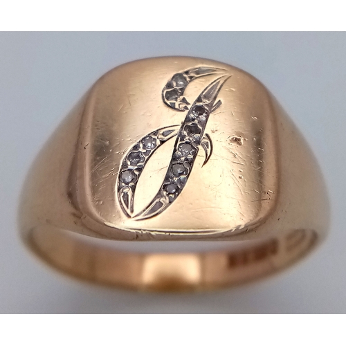 44 - A 9K Yellow Gold Diamond Set Letter 'J' Signet Ring. Size T. 5.1g.