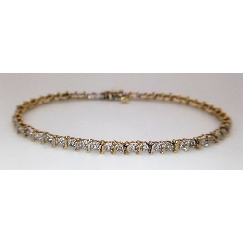 520 - A 9K Yellow Gold Diamond Tennis Bracelet. 18cm. 4.48g.