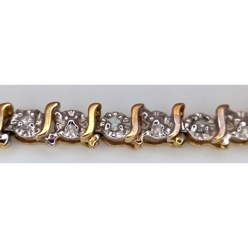 520 - A 9K Yellow Gold Diamond Tennis Bracelet. 18cm. 4.48g.