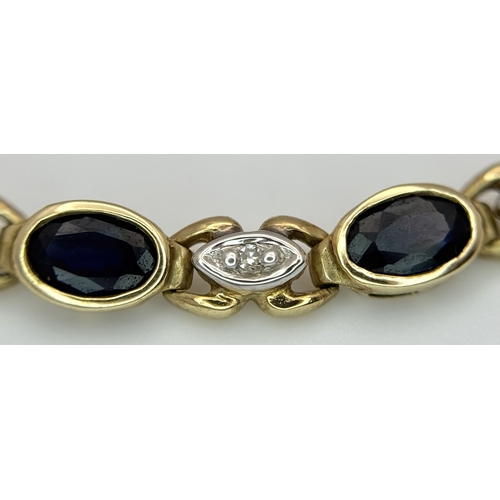 521 - A 9K Yellow Gold Diamond and Sapphire Bracelet. Oval cut sapphires and small round brilliant cut dia... 