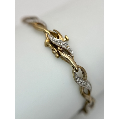 528 - A 9K Yellow and White Gold Twist Link Bracelet. 19cm. 6.05g.