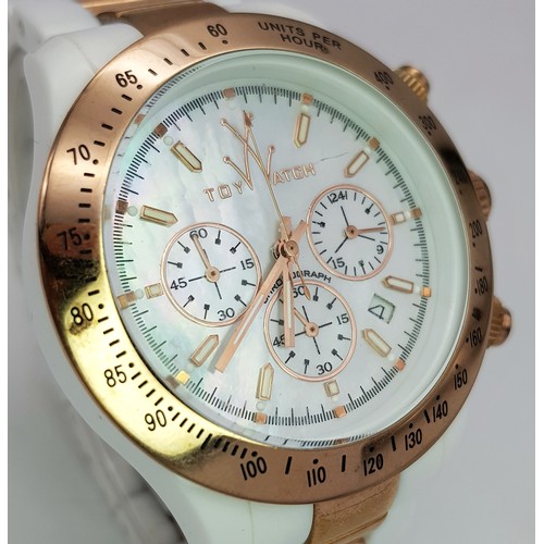 A TOY WATCH, CHRONOGRAPH, ROSE GOLD TONE AND WHITE PLASTIC BRACELET WATCH.  IN FULL WORKING ORDER. NE
