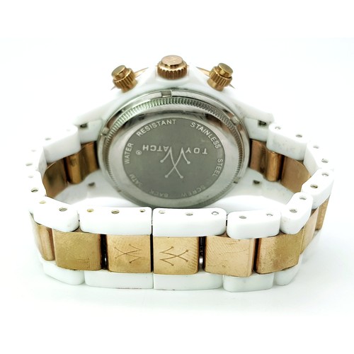 A TOY WATCH, CHRONOGRAPH, ROSE GOLD TONE AND WHITE PLASTIC BRACELET WATCH.  IN FULL WORKING ORDER. NE