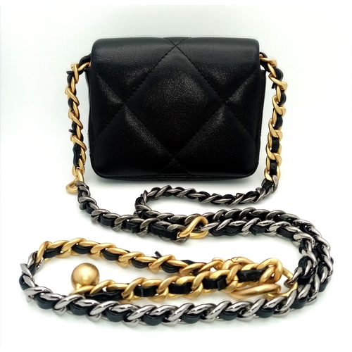 5 - A Chanel 19 Black Leather Wallet On Chain. Black quilted leather exterior with mixed gold and silver... 