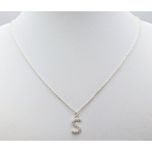 1210 - A PAIR OF STERLING SILVER NECKLACES WITH INITIAL S PENDANTS. ONE IS STONE SET. TOTAL WEIGHT 2.9G. A/... 