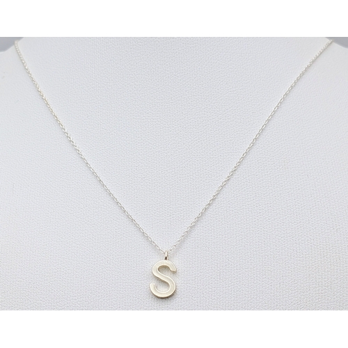 1210 - A PAIR OF STERLING SILVER NECKLACES WITH INITIAL S PENDANTS. ONE IS STONE SET. TOTAL WEIGHT 2.9G. A/... 