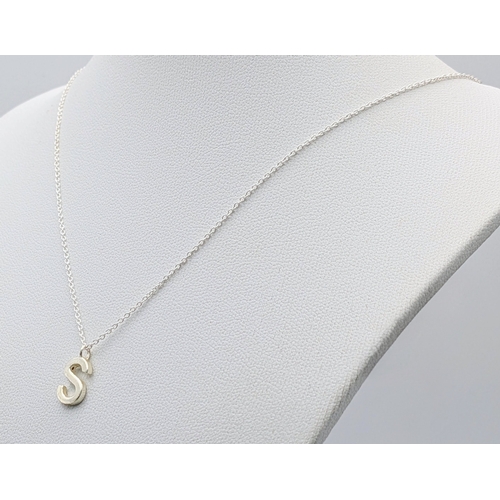 1210 - A PAIR OF STERLING SILVER NECKLACES WITH INITIAL S PENDANTS. ONE IS STONE SET. TOTAL WEIGHT 2.9G. A/... 