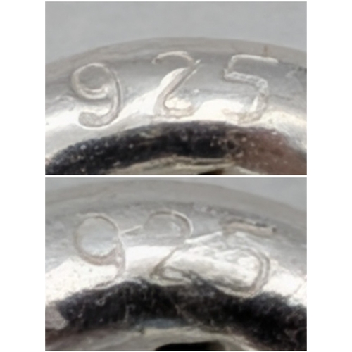 1210 - A PAIR OF STERLING SILVER NECKLACES WITH INITIAL S PENDANTS. ONE IS STONE SET. TOTAL WEIGHT 2.9G. A/... 