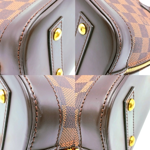 33 - A Brown Louis Vuitton Damier Ebene Alma BB Handbag. Brown textile exterior with gold-tone hardware, ... 
