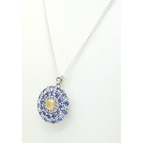 503 - A Beautiful Sterling Silver Hand Crafted Tanzanite, Opal and White Topaz
Pendant Necklace. 46cm Leng... 