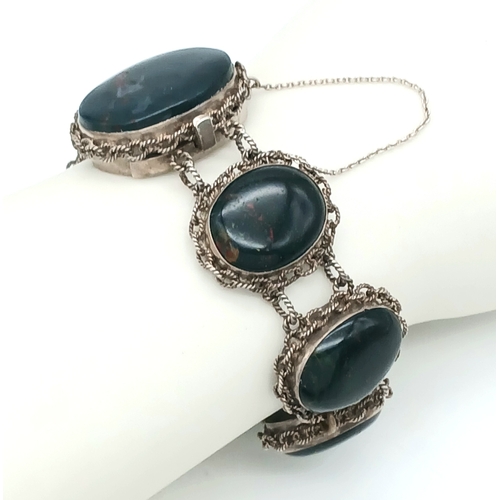 510 - An Elegant and Unique Vintage or Older Silver and Bloodstone Bracelet- Circa
18.5 to 19cm Length. Th... 