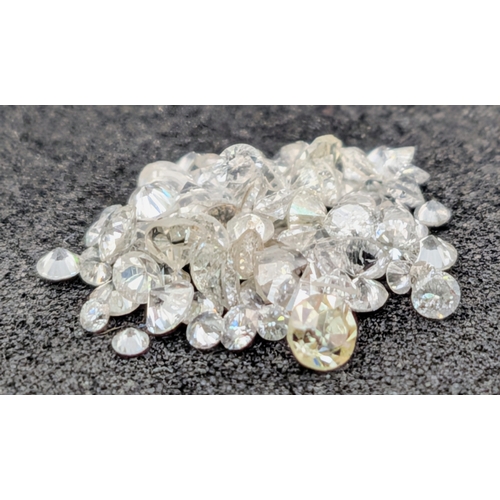 523 - A PARCEL OF NATURAL ROUND BRILLIANT CUT DIAMONDS. 1.02CT WEIGHT. ABSC 2003