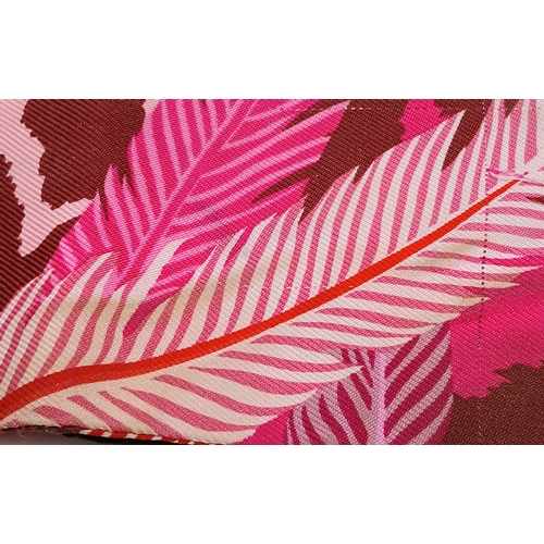 550 - Two Hermès “Jaguar Quetzal” Twilly Scarves. In a vibrant pink, rose and bordeaux colour palette with... 