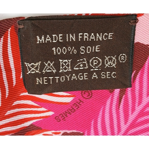 550 - Two Hermès “Jaguar Quetzal” Twilly Scarves. In a vibrant pink, rose and bordeaux colour palette with... 