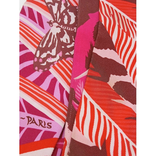 550 - Two Hermès “Jaguar Quetzal” Twilly Scarves. In a vibrant pink, rose and bordeaux colour palette with... 
