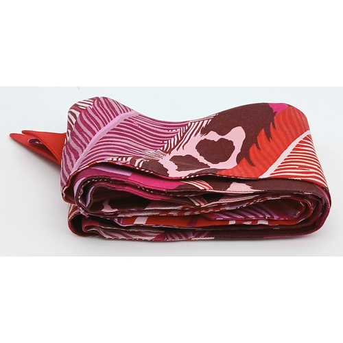 550 - Two Hermès “Jaguar Quetzal” Twilly Scarves. In a vibrant pink, rose and bordeaux colour palette with... 