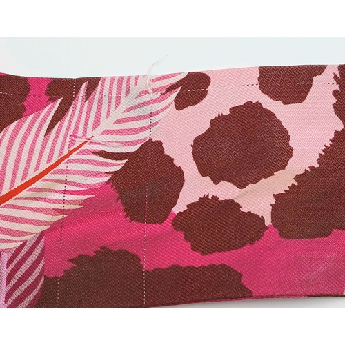 550 - Two Hermès “Jaguar Quetzal” Twilly Scarves. In a vibrant pink, rose and bordeaux colour palette with... 
