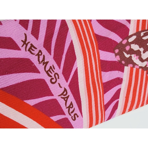 550 - Two Hermès “Jaguar Quetzal” Twilly Scarves. In a vibrant pink, rose and bordeaux colour palette with... 