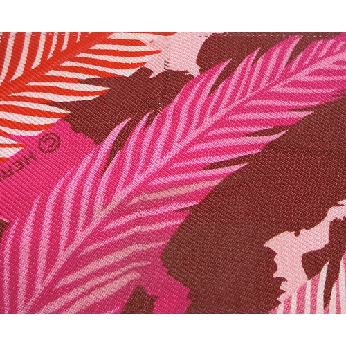 550 - Two Hermès “Jaguar Quetzal” Twilly Scarves. In a vibrant pink, rose and bordeaux colour palette with... 
