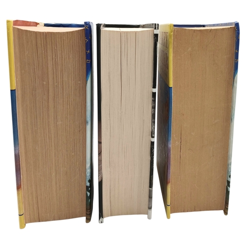 524 - A Parcel of Three First Edition Harry Potter Books Including the misprint edition of Harry Potter an... 