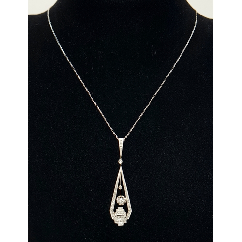 514 - An 18K White Gold (tests as) White Stone Pendant on an 18K Gold Chain. 4.5cm and 42cm. Ref: 1.8. 3.6... 