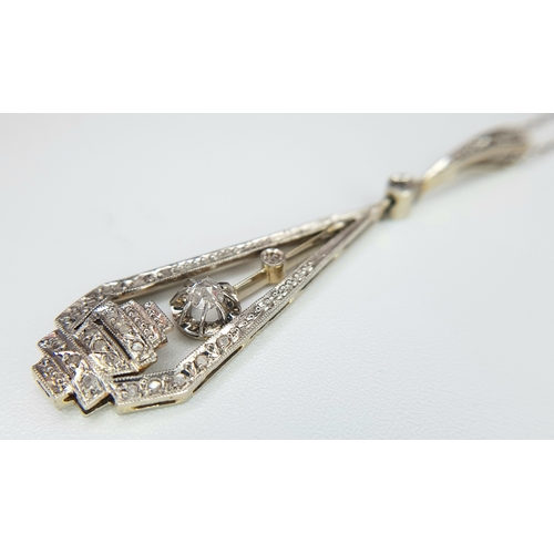 514 - An 18K White Gold (tests as) White Stone Pendant on an 18K Gold Chain. 4.5cm and 42cm. Ref: 1.8. 3.6... 