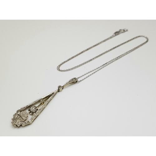 514 - An 18K White Gold (tests as) White Stone Pendant on an 18K Gold Chain. 4.5cm and 42cm. Ref: 1.8. 3.6... 