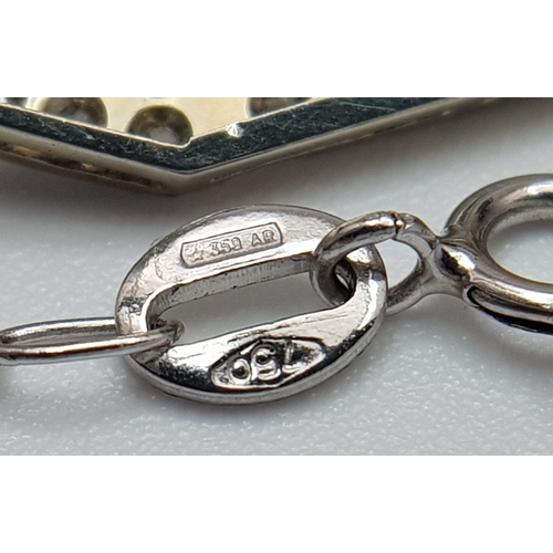 514 - An 18K White Gold (tests as) White Stone Pendant on an 18K Gold Chain. 4.5cm and 42cm. Ref: 1.8. 3.6... 