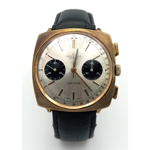 1177 - A Vintage Breitling Top Time Gents Chronograph Watch. Black leather strap. Gilded case - 39mm. Silve... 