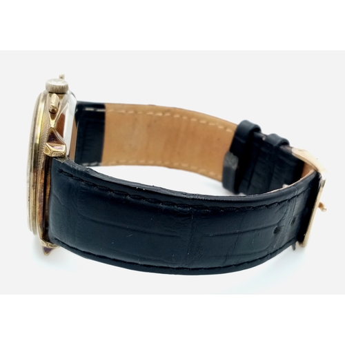 1177 - A Vintage Breitling Top Time Gents Chronograph Watch. Black leather strap. Gilded case - 39mm. Silve... 