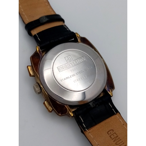 1177 - A Vintage Breitling Top Time Gents Chronograph Watch. Black leather strap. Gilded case - 39mm. Silve... 