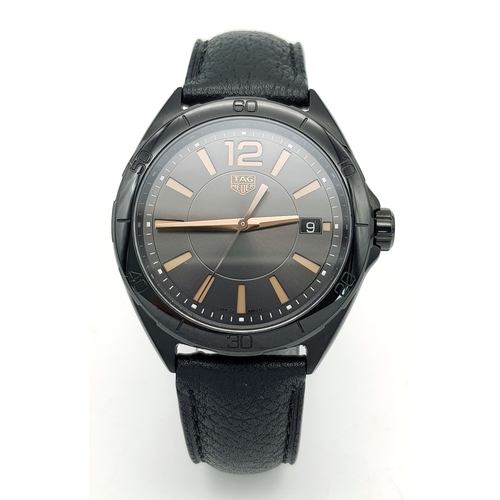 1198 - A Tag Heuer Formula 1 Quartz Ladies Watch. Model WBJ1314. Black leather strap. PVD case - 36mm. Blac... 