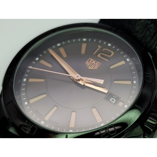 1198 - A Tag Heuer Formula 1 Quartz Ladies Watch. Model WBJ1314. Black leather strap. PVD case - 36mm. Blac... 