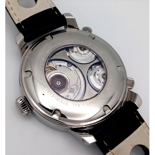 1205 - A Glycine Airman 7 Crosswise Automatic Gents Watch. Model 3841. Black silicone and leather strap. La... 